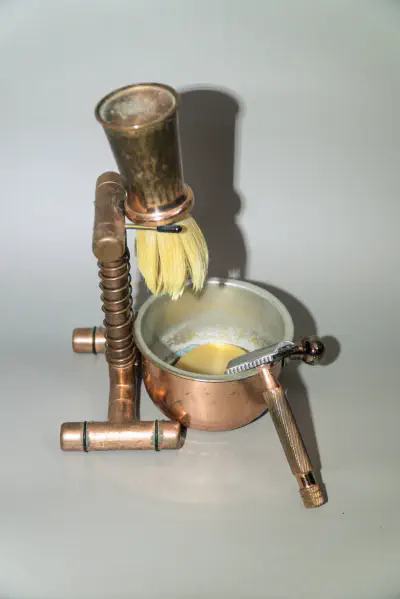 The Above the Tie razor with brush, bowl and stand